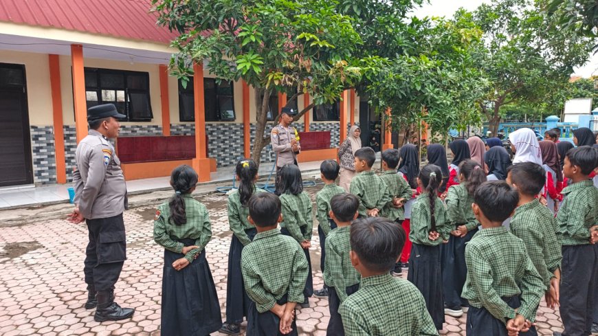 BHABINKAMTIBMAS DESA KERTOSARI JADI PEMBINA APEL DI SDN 1 KERTOSARI